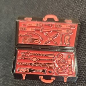 Elegant Red and Black Brooch